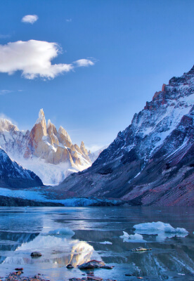 Laguna Torre is a stunning lake, boasting a light blue color and spectacular vistas of the surrounding mountains.