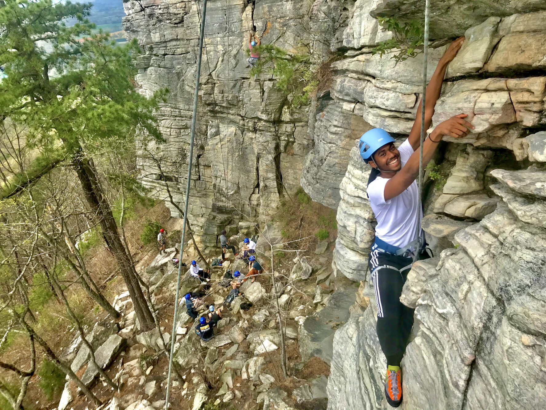 A climber top roping at Pilot Mountain, NC’s most welcoming beginner crag.