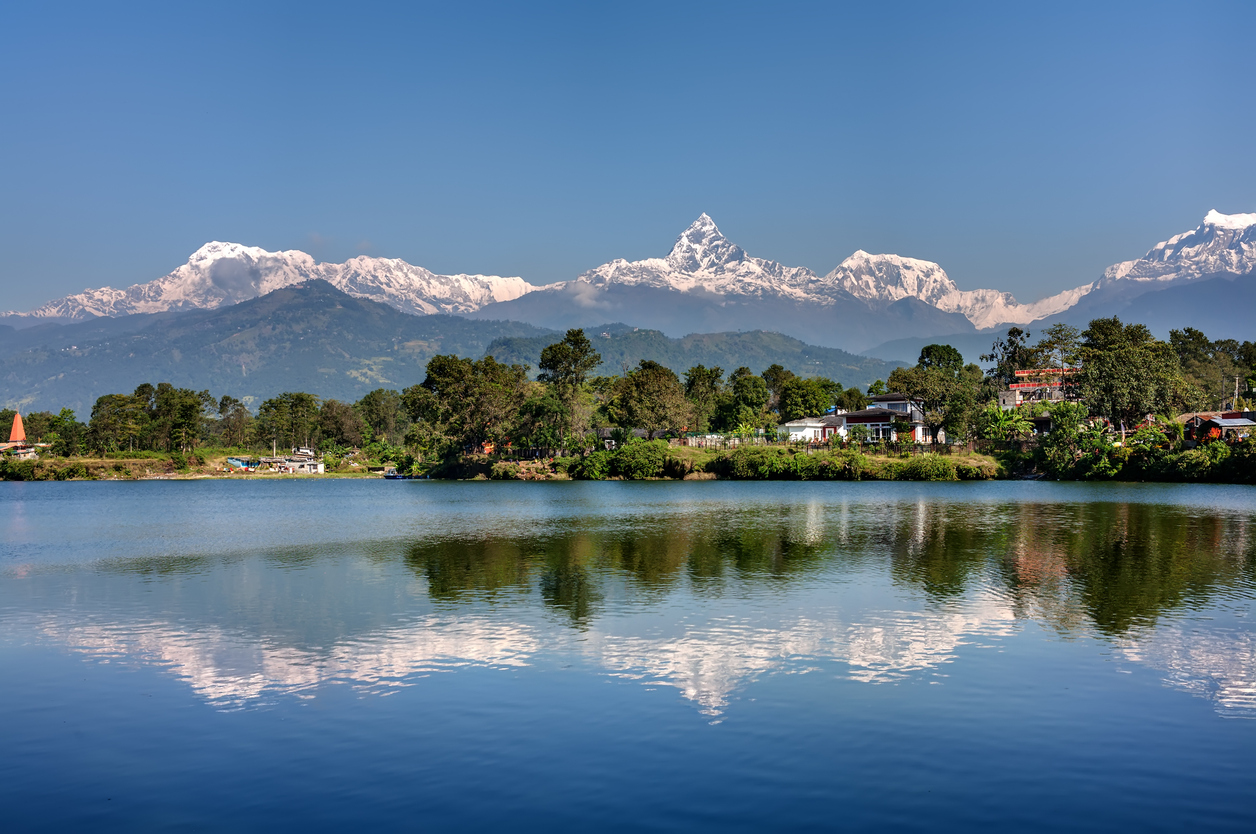 Annapurna Range and its reflection in Phewa Lake in Pokhara