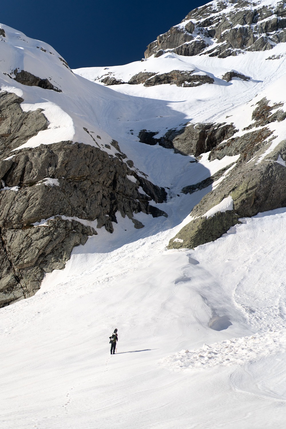 A backcountry skier and stunning nature in Racha