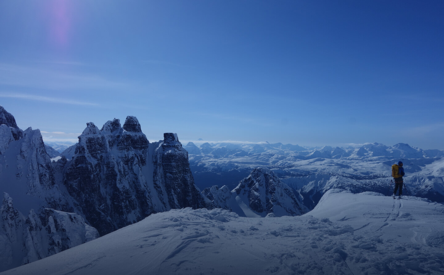 Summiting the mountain peaks of British Columbia and admiring the breathtaking views.