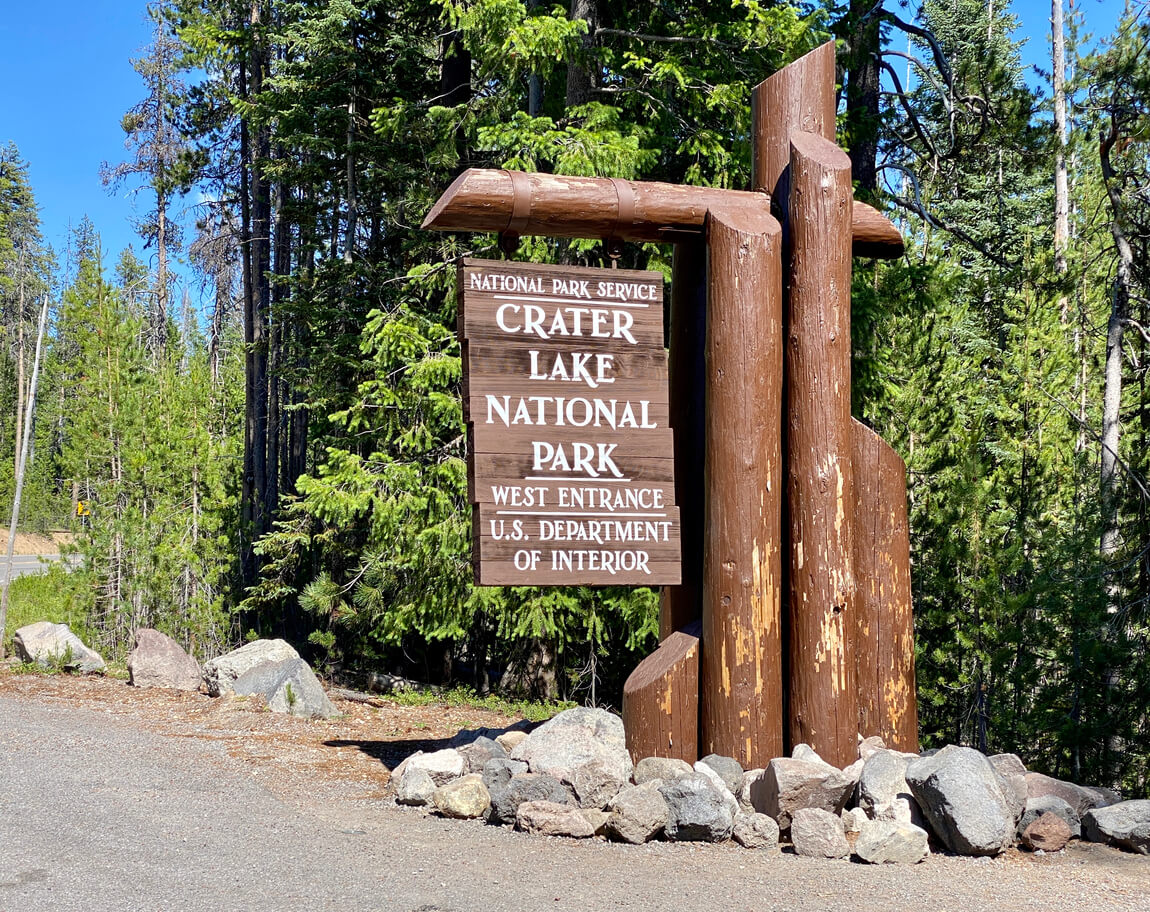 A sign at the entrance of Crater Lake National Park