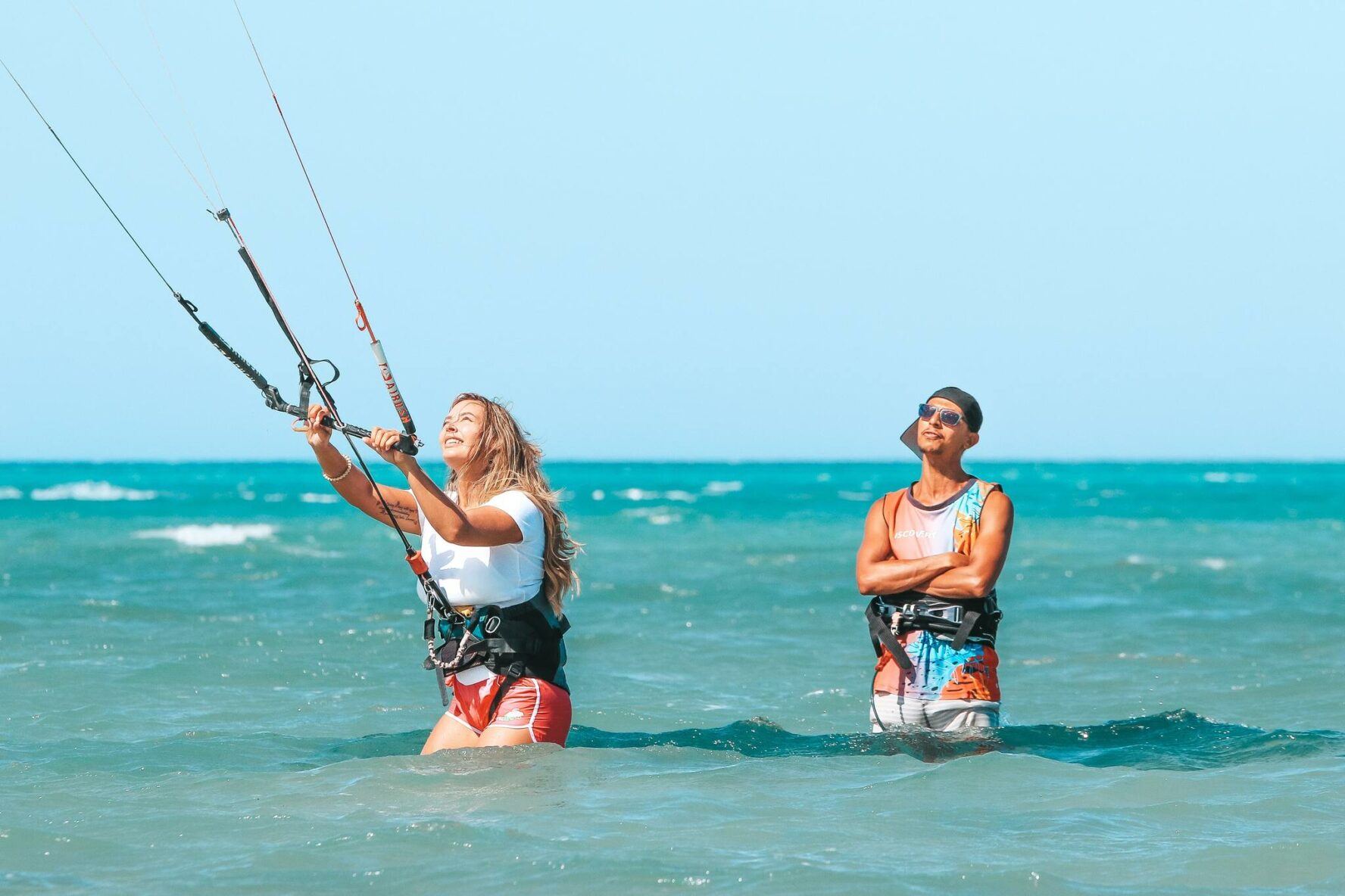 A guide and a client working on kitesurfing skills in Hurghada