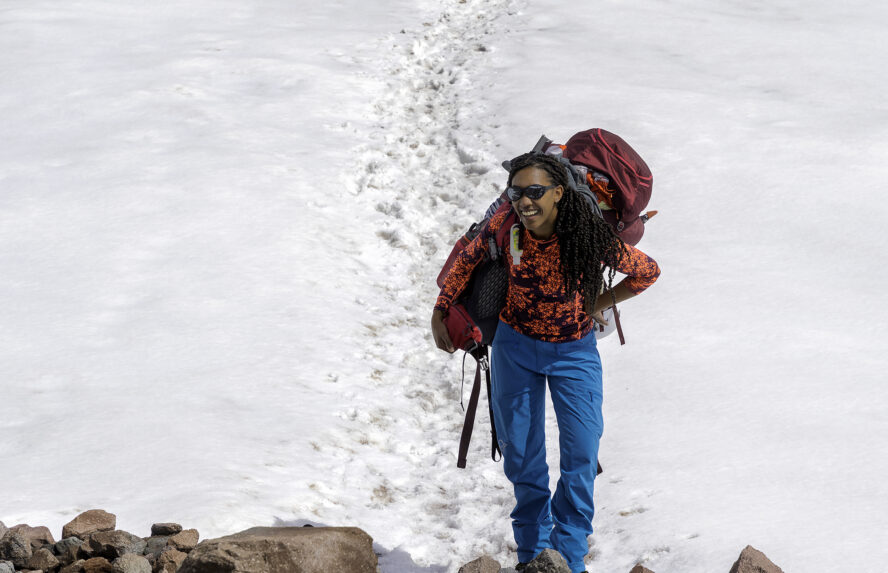 The author’s winter hiking backpack is nearly the same size as her body.