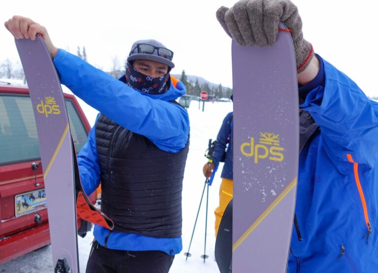 A ski guide teaching the skier all about skins