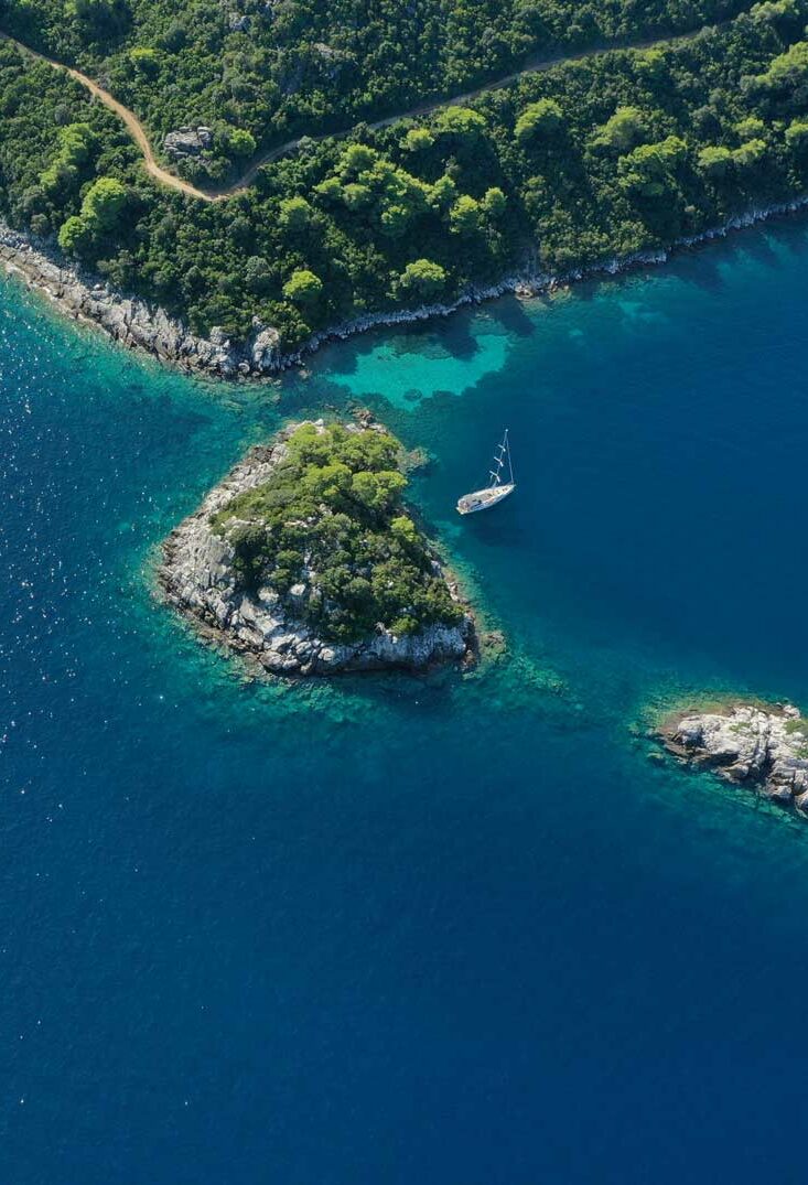 Blue sea and green rocky islands in Croatia