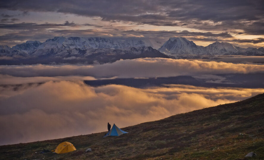  A backpacker admiring a sunset in Denali National Park