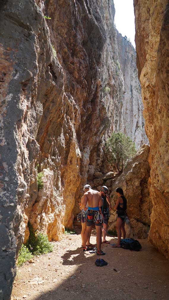 Climbers preparing to send one of the routes on the crag