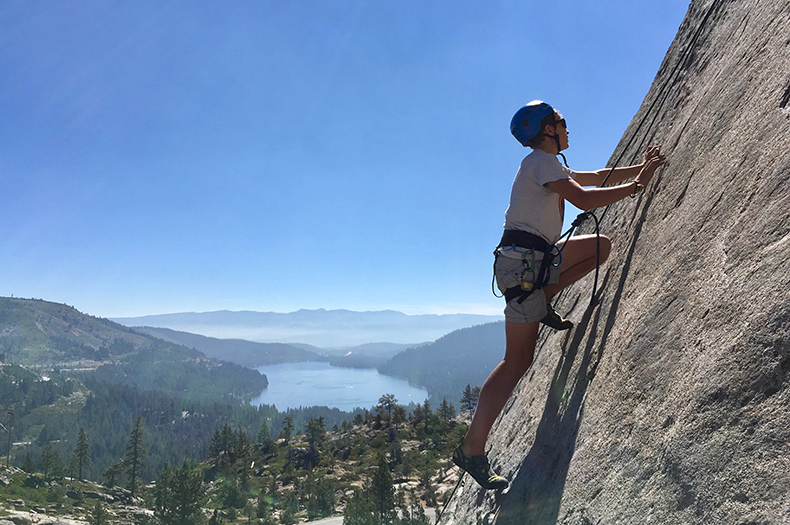 A kid climbing on Donner Summit
