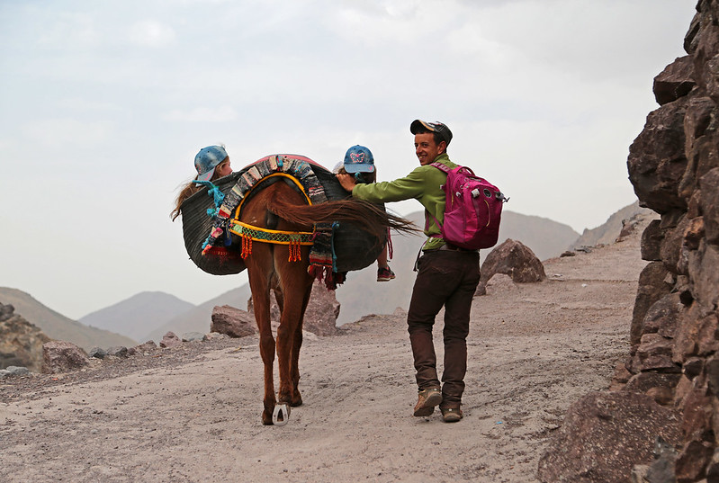 A family and a donkey on a pathway near Imlil, Mount Toubkal
