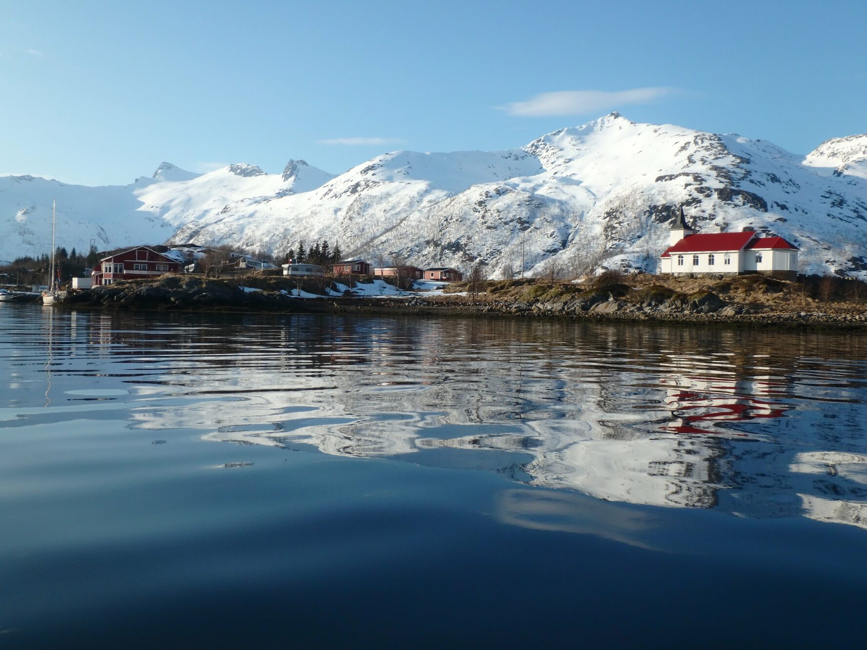 Coastal city and church with the mountains in the background
