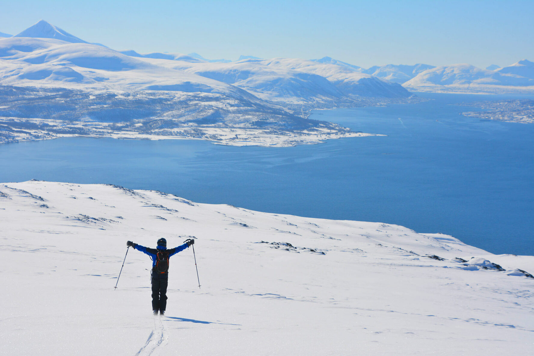 A skier in Norway on a skiing and sailing trip