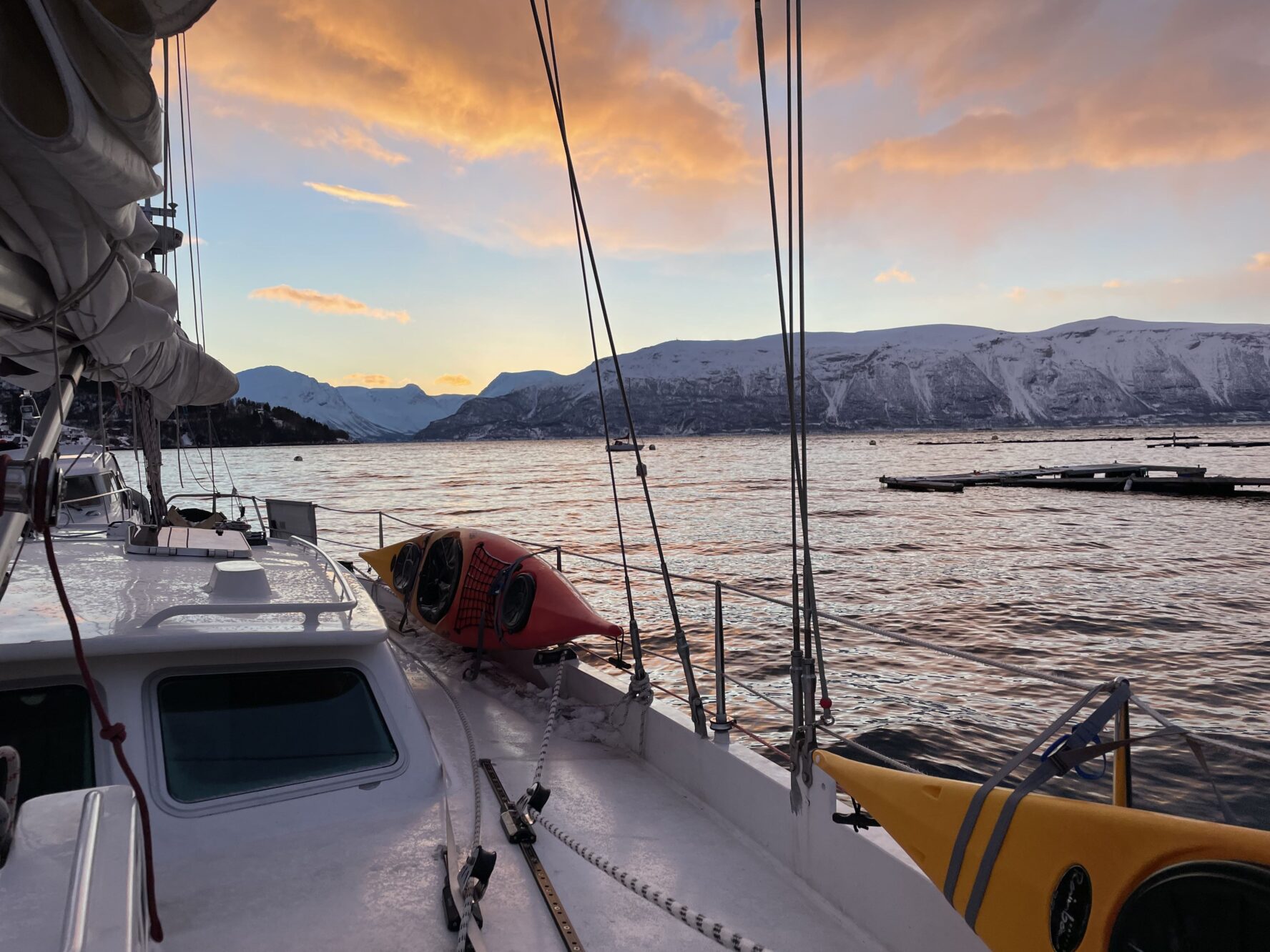 Beautiful sunset seen from the sailboat. blue and orange hues decorating the skies