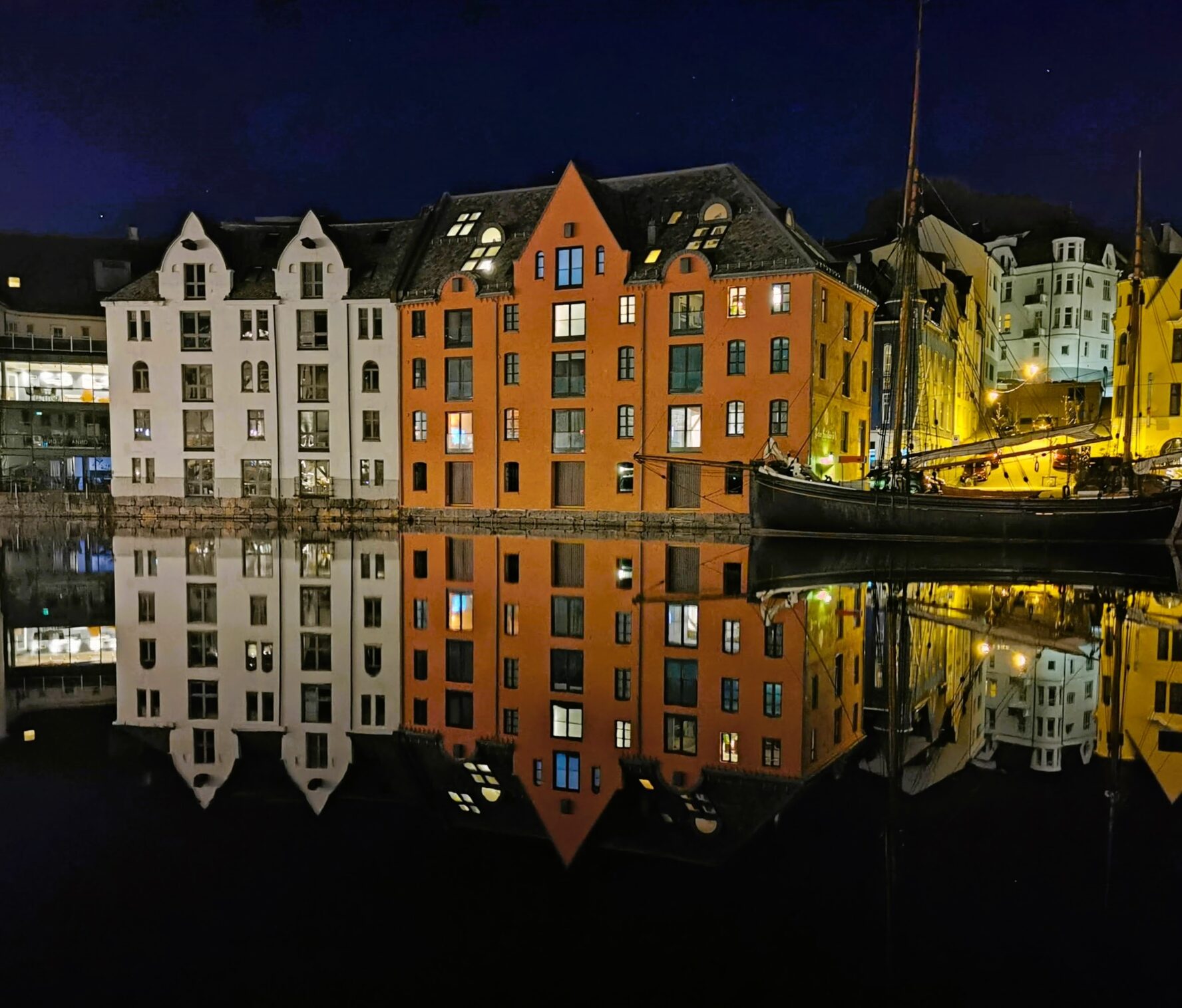The coastal town of Alesund, Norway, at night