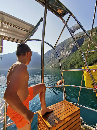 A boy on board a sailing boat in Norway