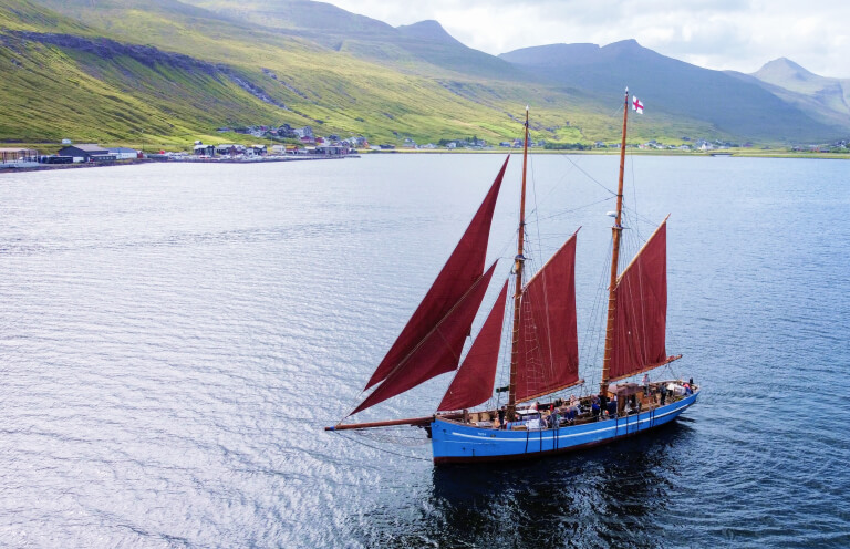 Norðlýsið is the boat that will take you on an epic sailing adventure around the Faroe Islands.
