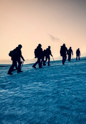Hikers treading on Iceland’s trails in winter.