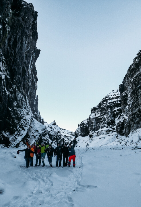 A hiking group enjoying their winter adventure in Iceland.