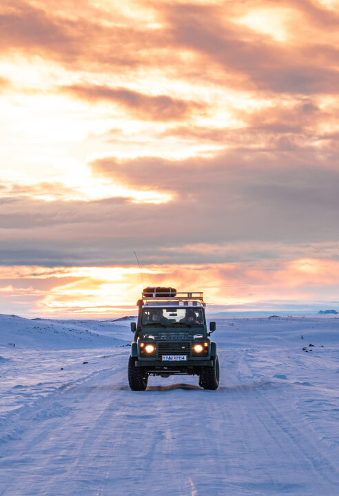 Enjoy Iceland’s winter sunsets from the comfort of the super jeep.