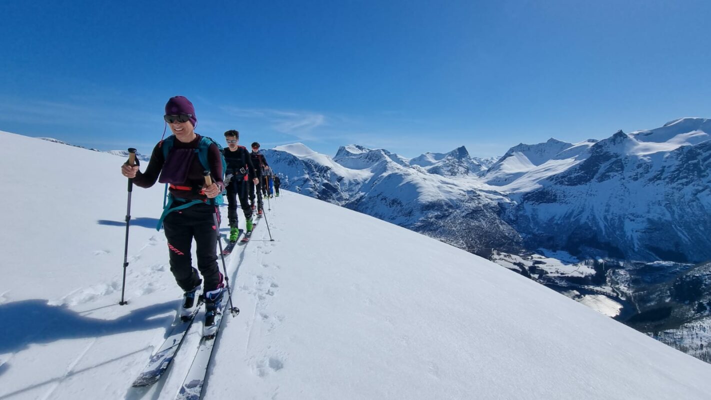 Skiers walking in a line in Norway