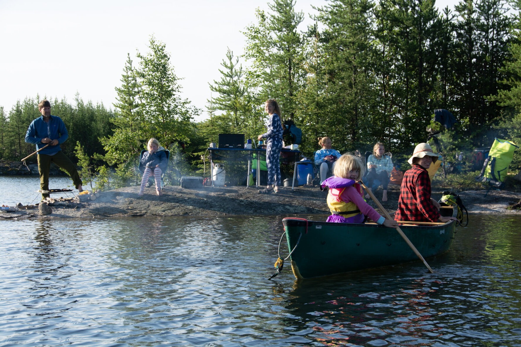 People relaxing and canoeing on the Paull River