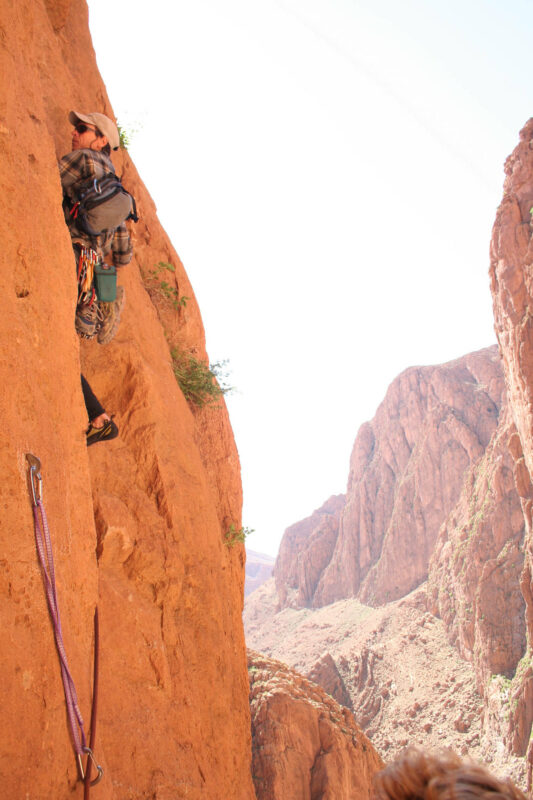A rock climber on a limestone wall in Todgha Gorge