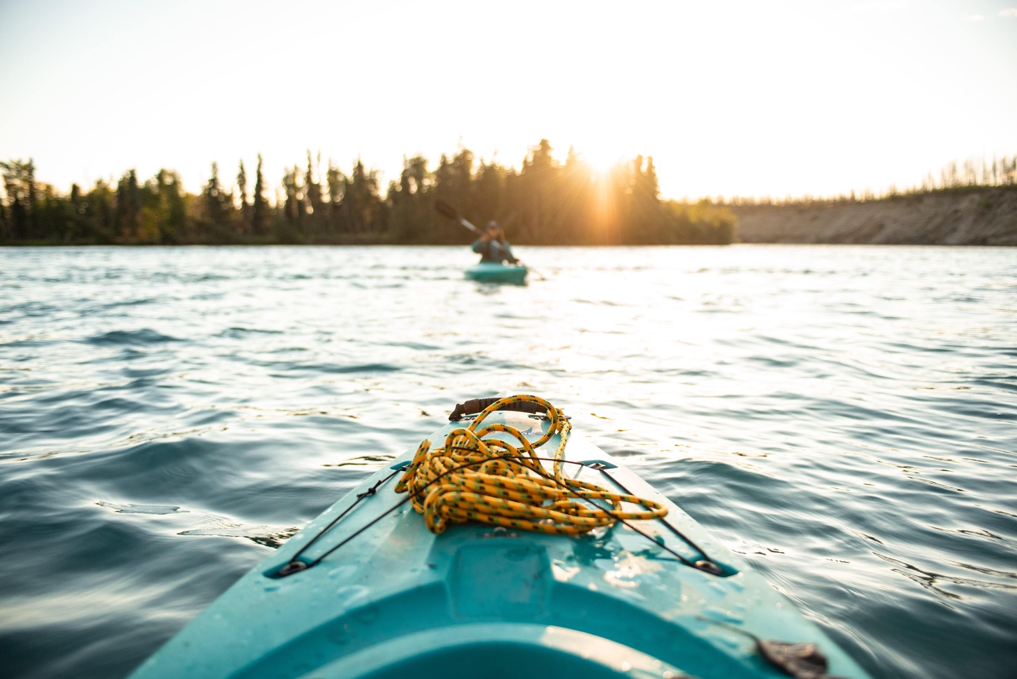 A sea kayak and a kayaker in Prince William Sound