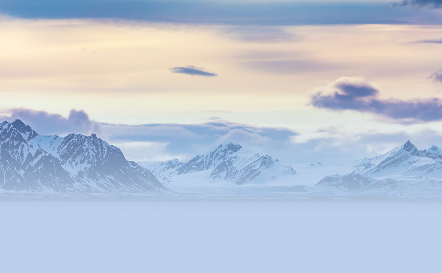 The polar landscape of Svalbard filled with mountain peaks and fjords is nothing short of magical.
