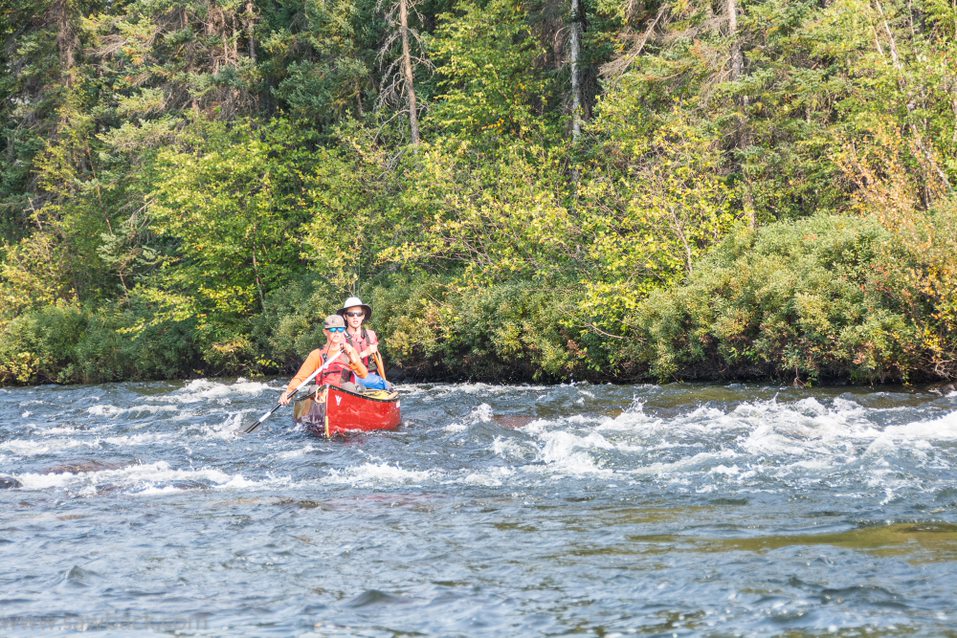 Two people in a canoe on the Hawkrock River