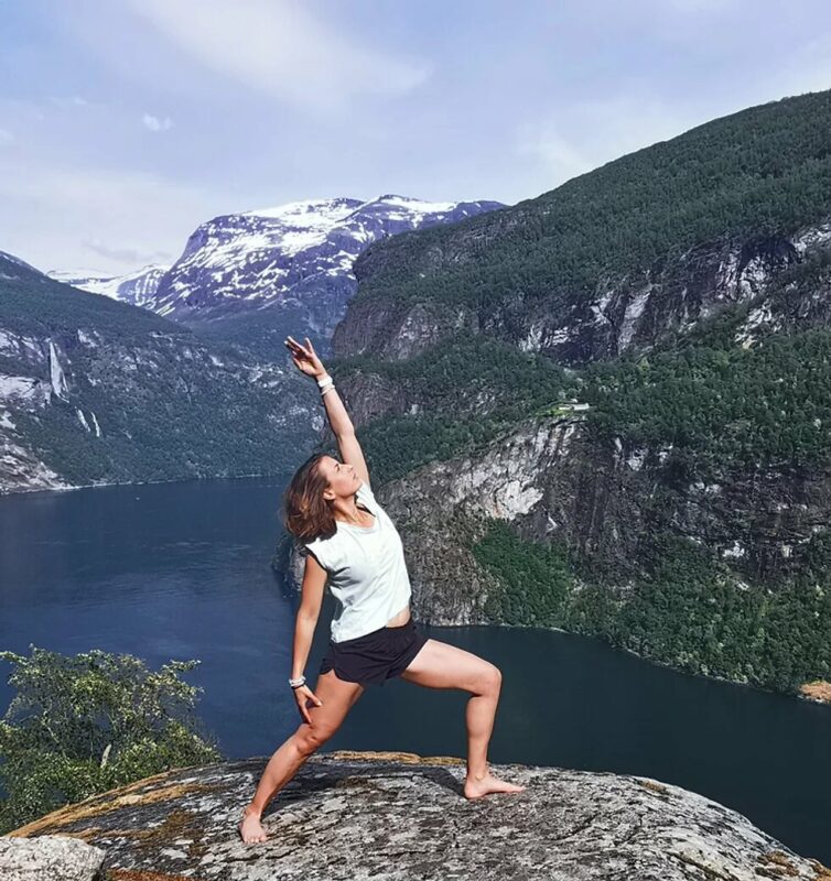 A woman doing yoga in nature, Norway