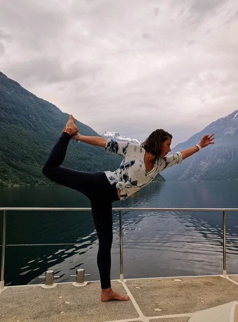 Woman in a yoga position in Norway