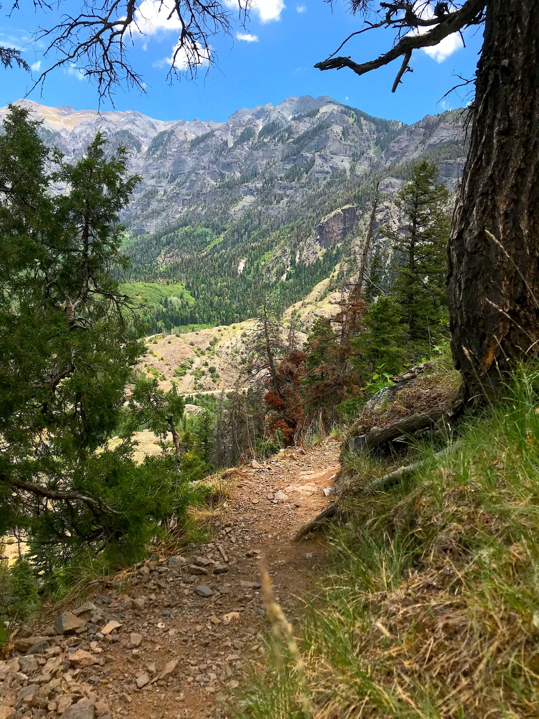Hiking the trails near Ouray, Colorado takes you to waterfalls, across bridges, and along dirt paths—never far from town to boot!