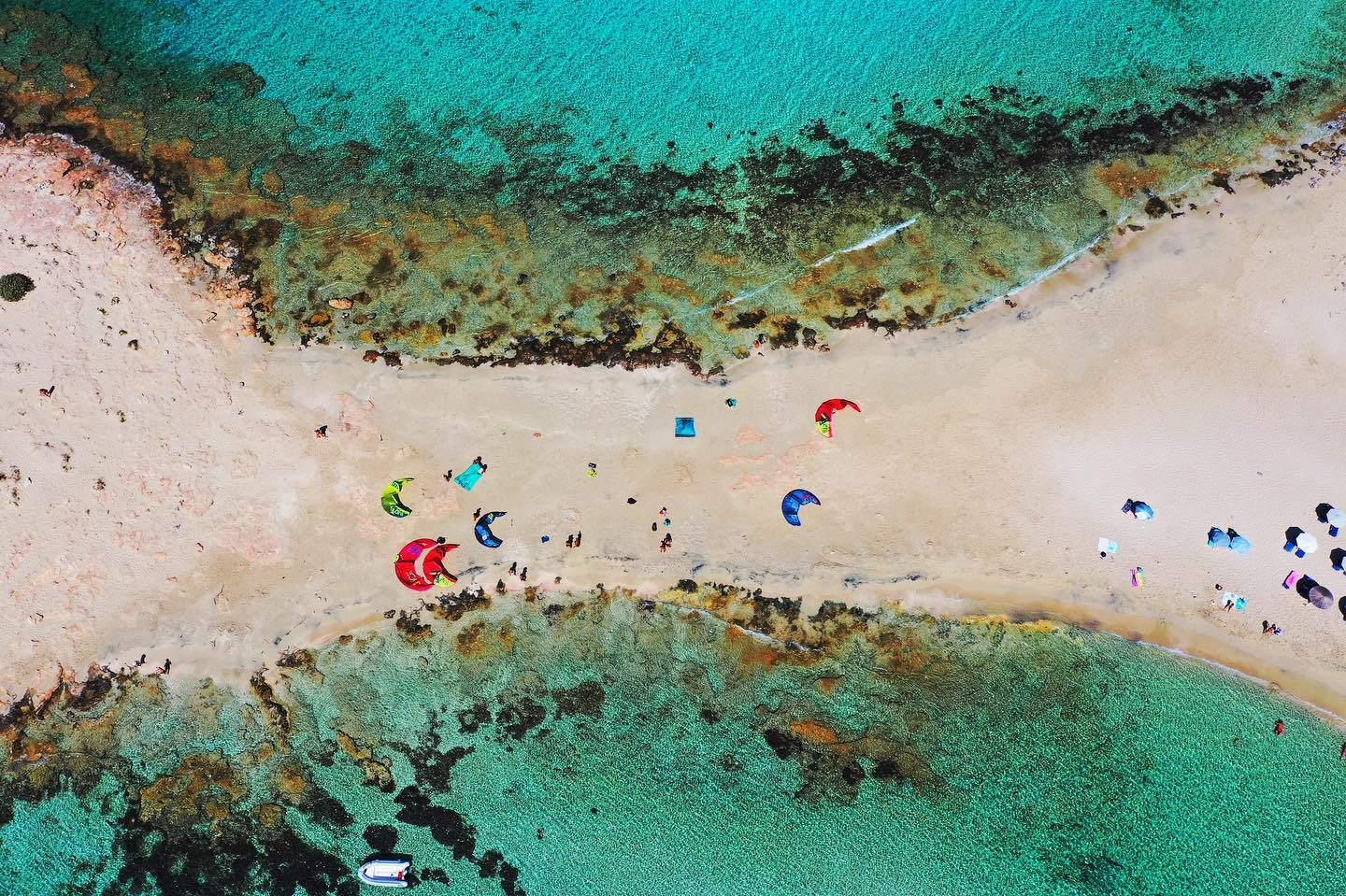 An aerial view of kitesurfers in the Cyclades, Greece