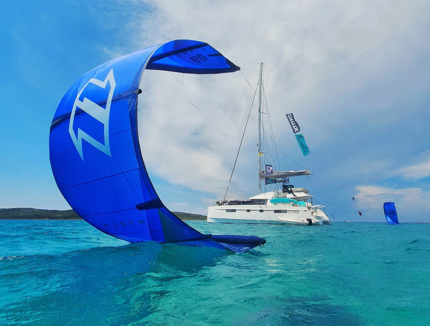 A catamaran and a kite in Sardinia