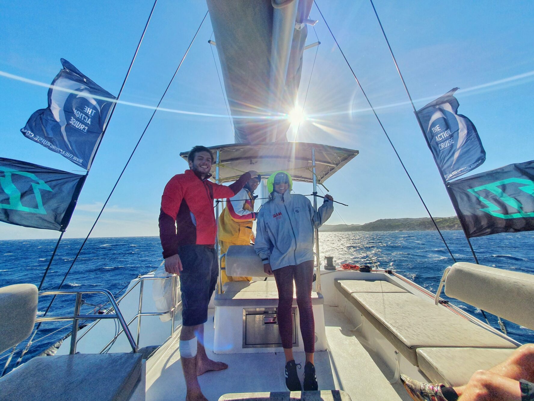 Kitesurfers posing on the boat