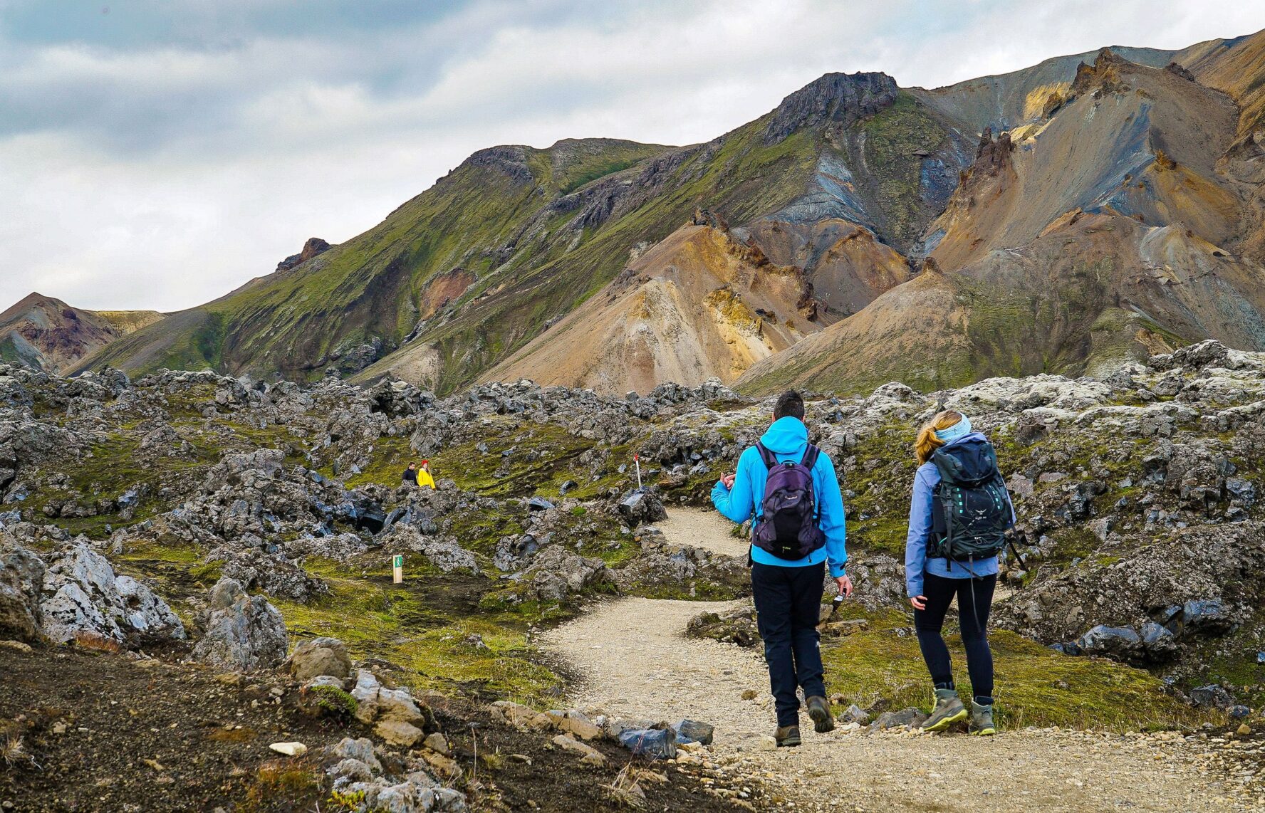 Two hikers enjoying the trek through an Icelanding valley