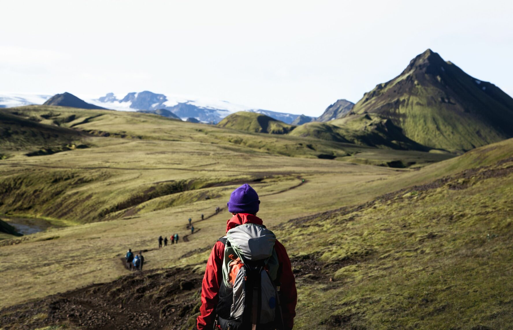 A person looking in the distance, Lauhavegur out of focus in the background