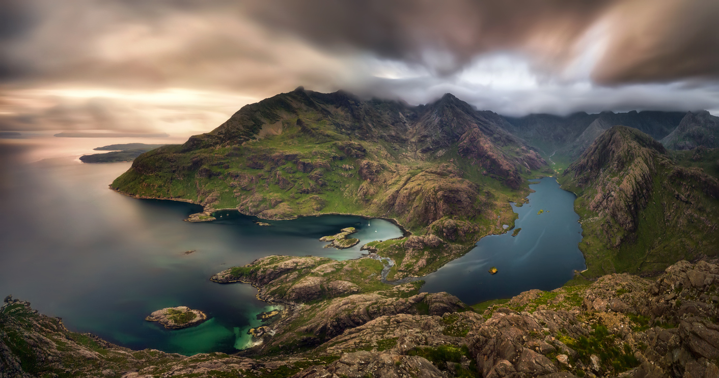 A panoramic view of the Cuillin Hills and lochs