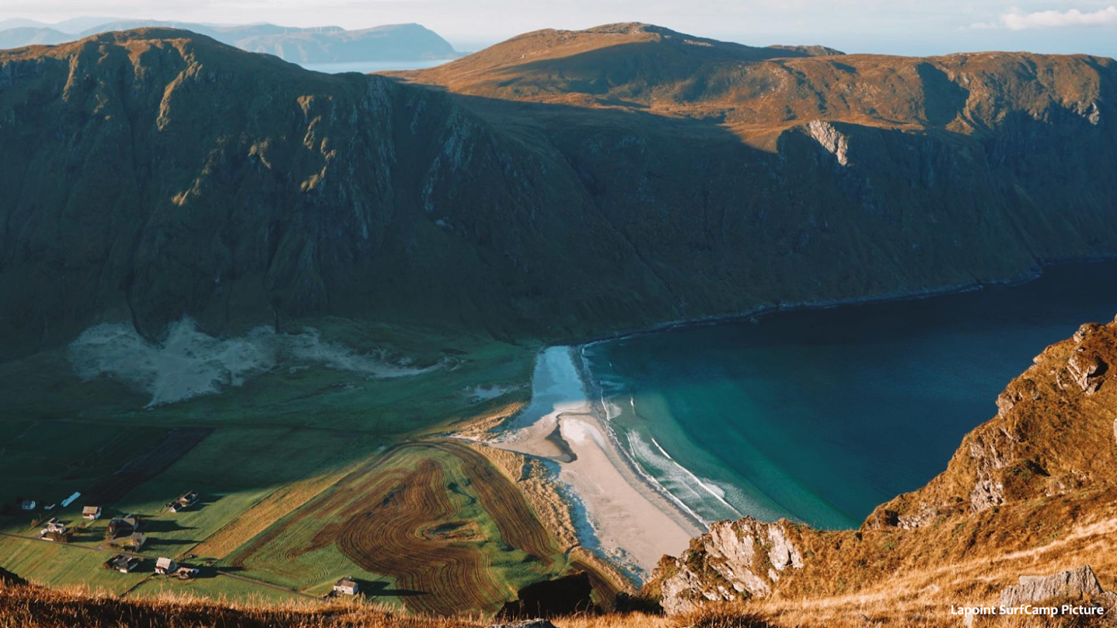 An overview of a white sandy beach in Norway