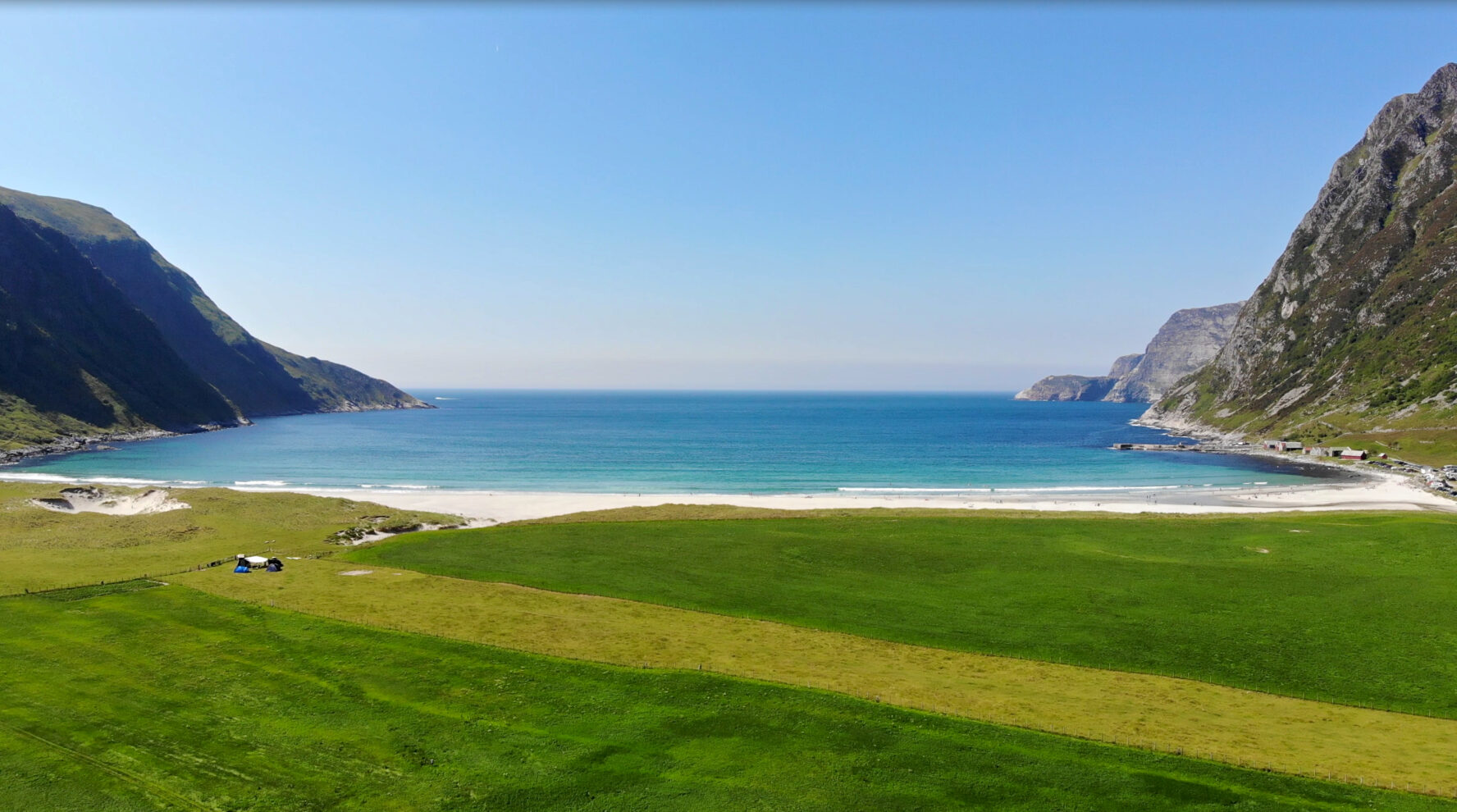 A view of the white sandy Hoddevikstranda beach in Norway