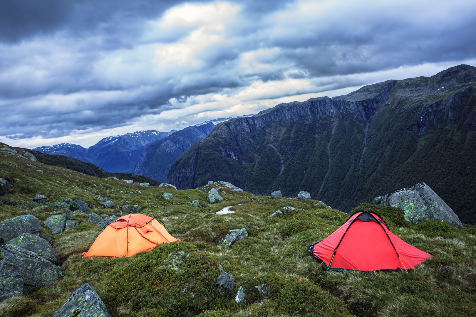 Colorful tents on a grassy field in Norway