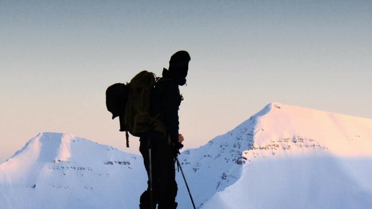 A backcountry skier watching landscapes in Iceland.