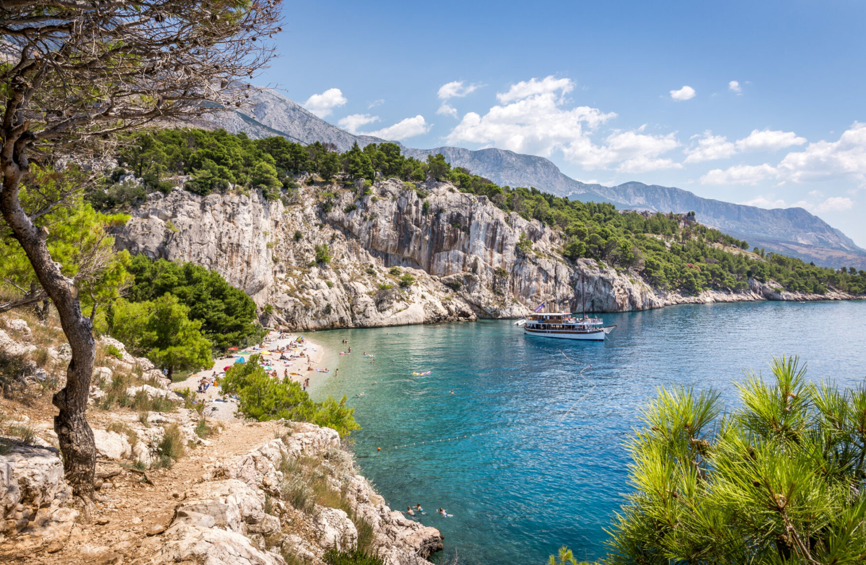 Beachgoers on Nugal Beach near Makarska village in Croatia.