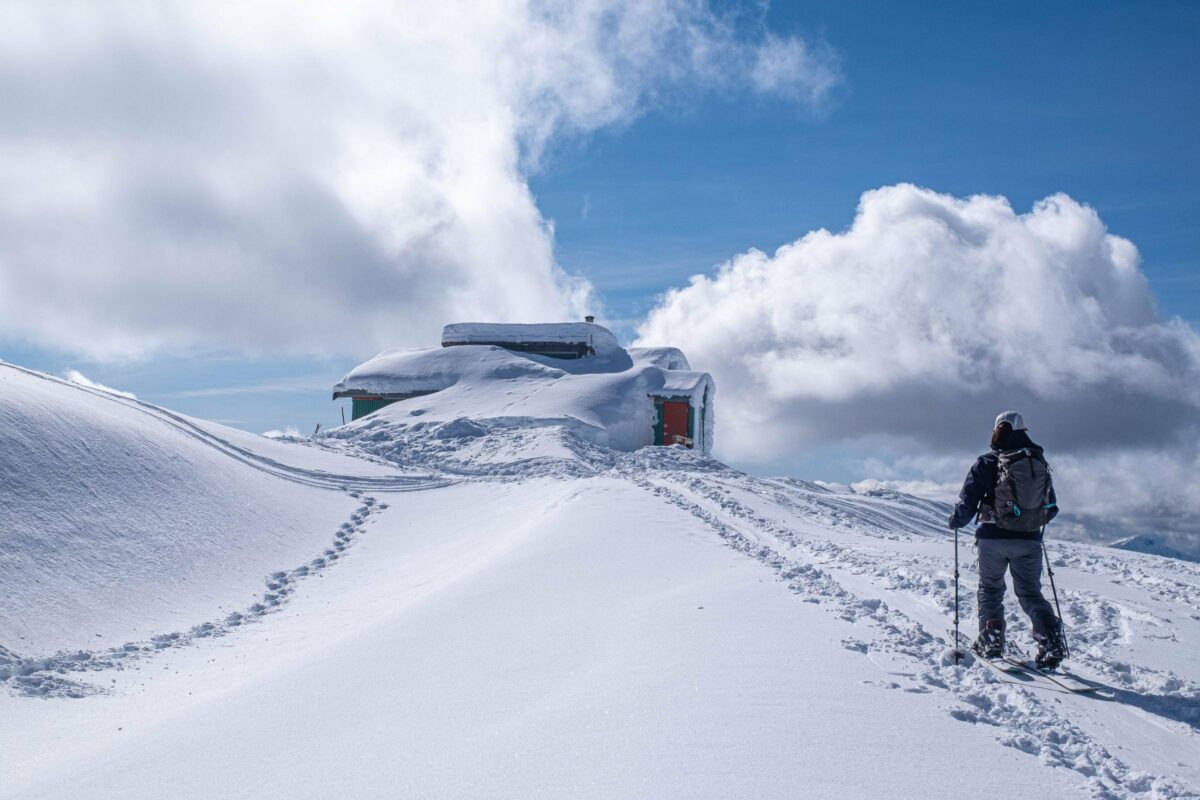 One backcountry skier going to the hut