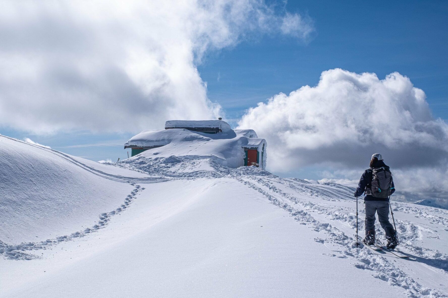 A skier reaching the Haberl Hut.