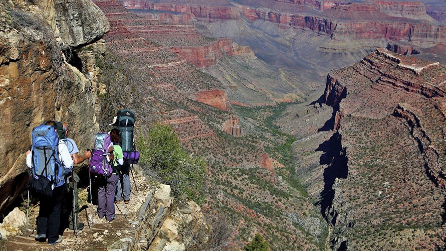 Hikers on scenic overlook in the Grandview Trek