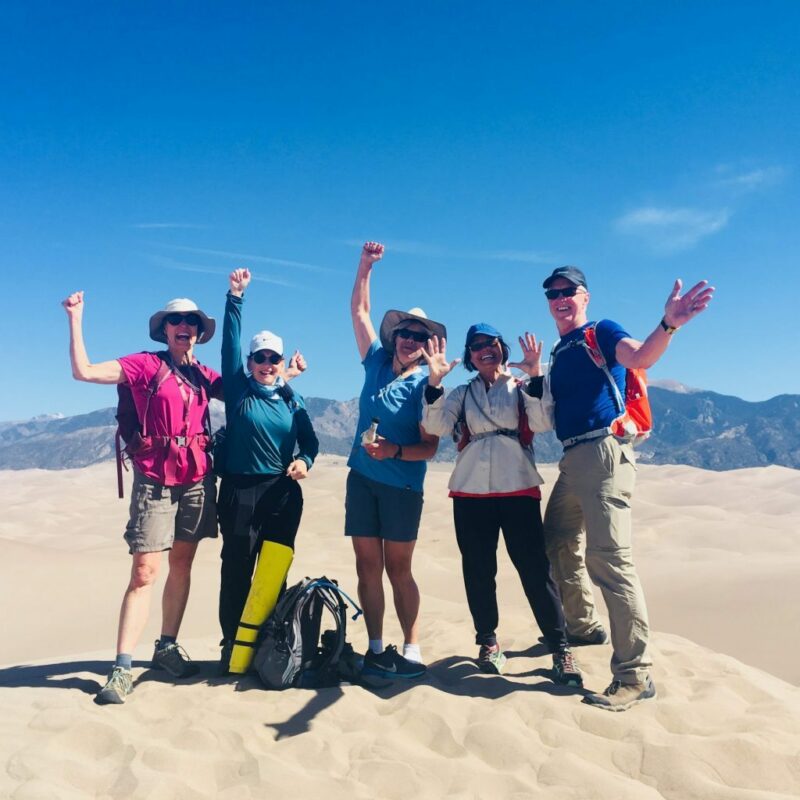 Happy cyclers on the shores of Lake Gull.