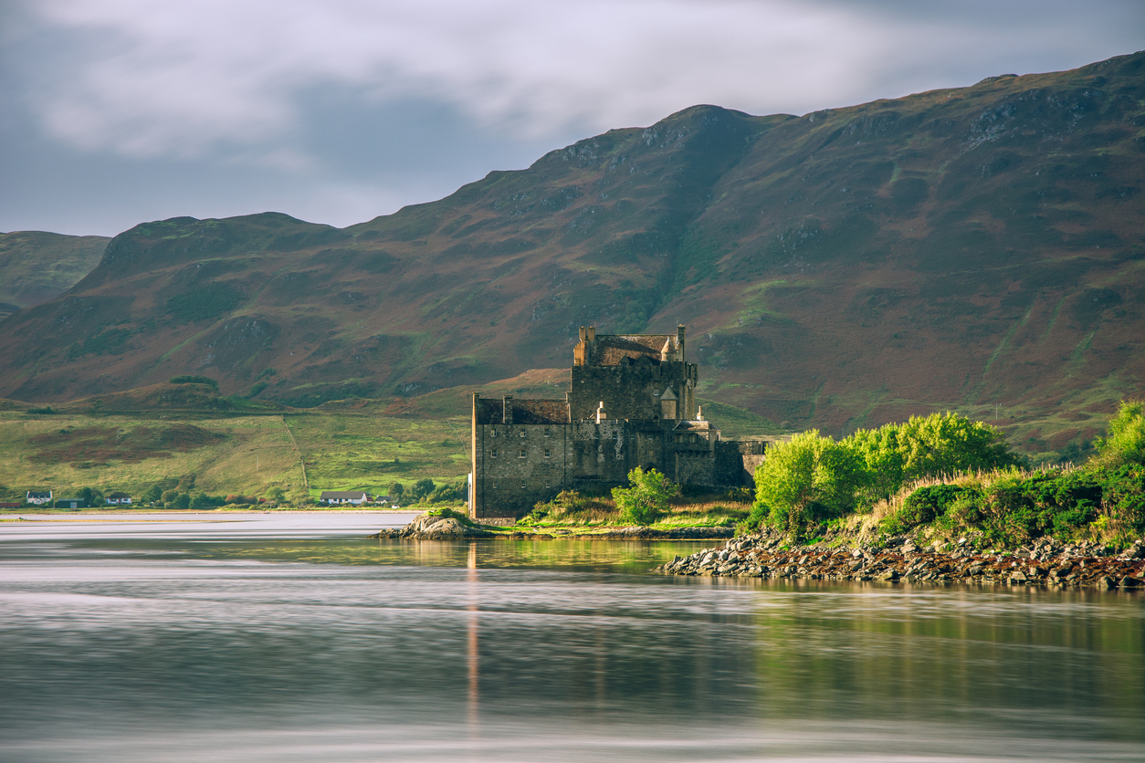Lake Duich and the castle standing by its shore in the Scottish Highlands seen while on a mountain biking trip.