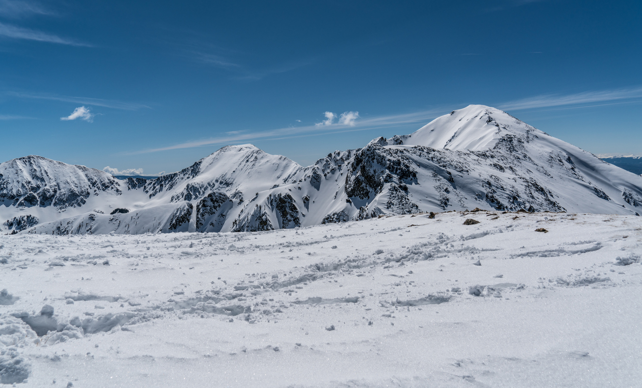 Tracks with the backdrop of Sangre de Cristo mountains.