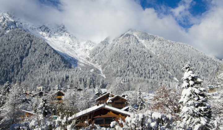 Traditional wooden Alpine houses seen at Brevent-Fleger ski resort, France.